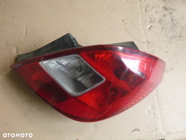 LAMPA PRAWY TYŁ PRAWA TYLNA OPEL CORSA D - 13