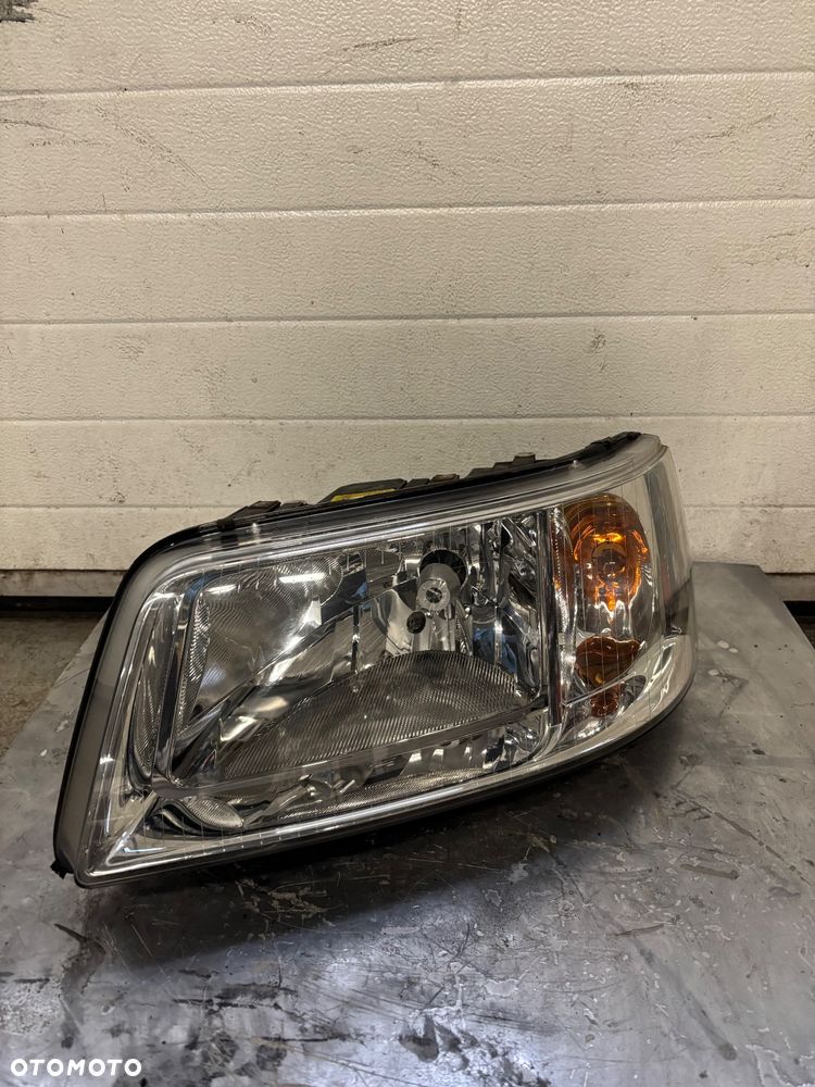 VW T5 LAMPA LEWY PRZOD PRZEDNIA 7H1941015 - 1