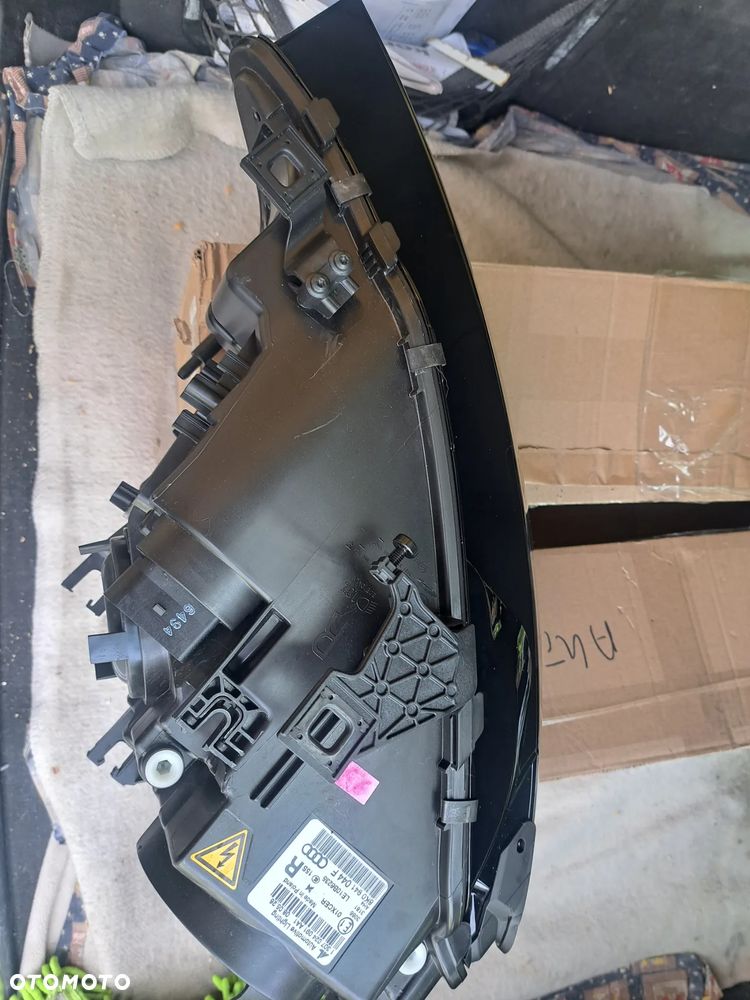 Nowa nieużywana oryginalna Aso lampa przednia prawa Audi A4 B8 lift biksenon neon led. Kod producenta:8KO 941 044 F - 11