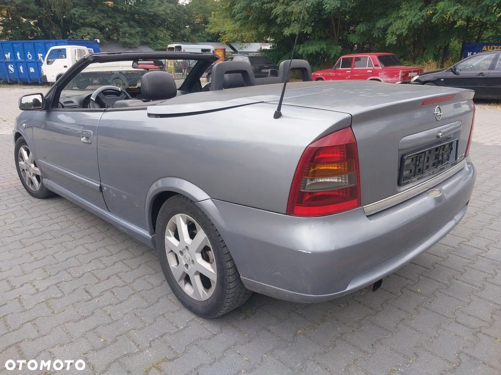 Opel Astra G Bertone Cabrio Cabriolet silnik 1.6 16v 103 KM skrzynia biegów F17 drzwi maska zderzak błotnik lusterko klapa Z4AU Z163 dach dachu składanego maglownica szyba podnośnik fotel kanapa zegary zestaw startowy czujnik felga maglownica zwrotnica sterownik panel moduł listwa wydech tłumik belka sanki zacisk jarzmo tarcza NA CZĘŚCI WSZYSTKIE CZĘŚCI - 9