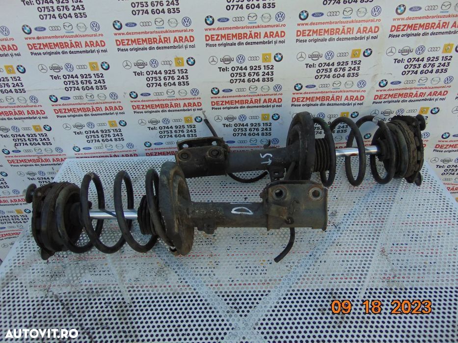 Telescop cu arc Renault Scenic 3 an 2009-2016  amortizoare fata stanga - 1