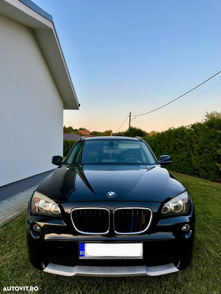 BMW X1 2011 — imagine 7
