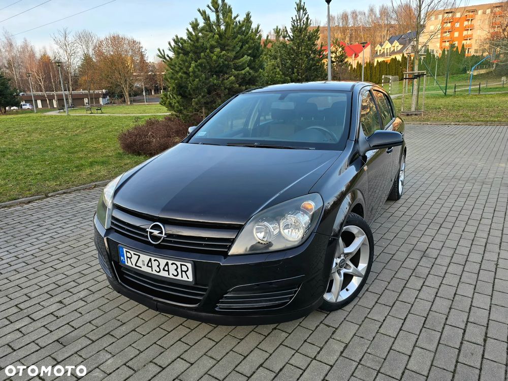 Opel Astra 1.8 Edition Plus - 12