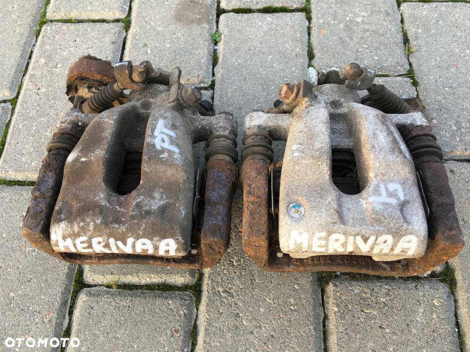 ZACISK HAMULCOWY TYŁ LEWY PRAWY OPEL MERIVA 03-10