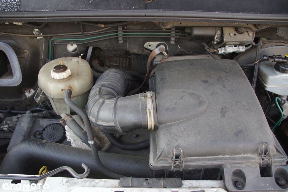 Auto na części - Opel Movano 1 I L2 2.8 DTI 114 KM S9W-702 M77 11U 2000R Silnik Skrzynia Drzwi Lusterka Szyba Maska Lampa Klamka Licznik Deska Kokpit Felga - 17