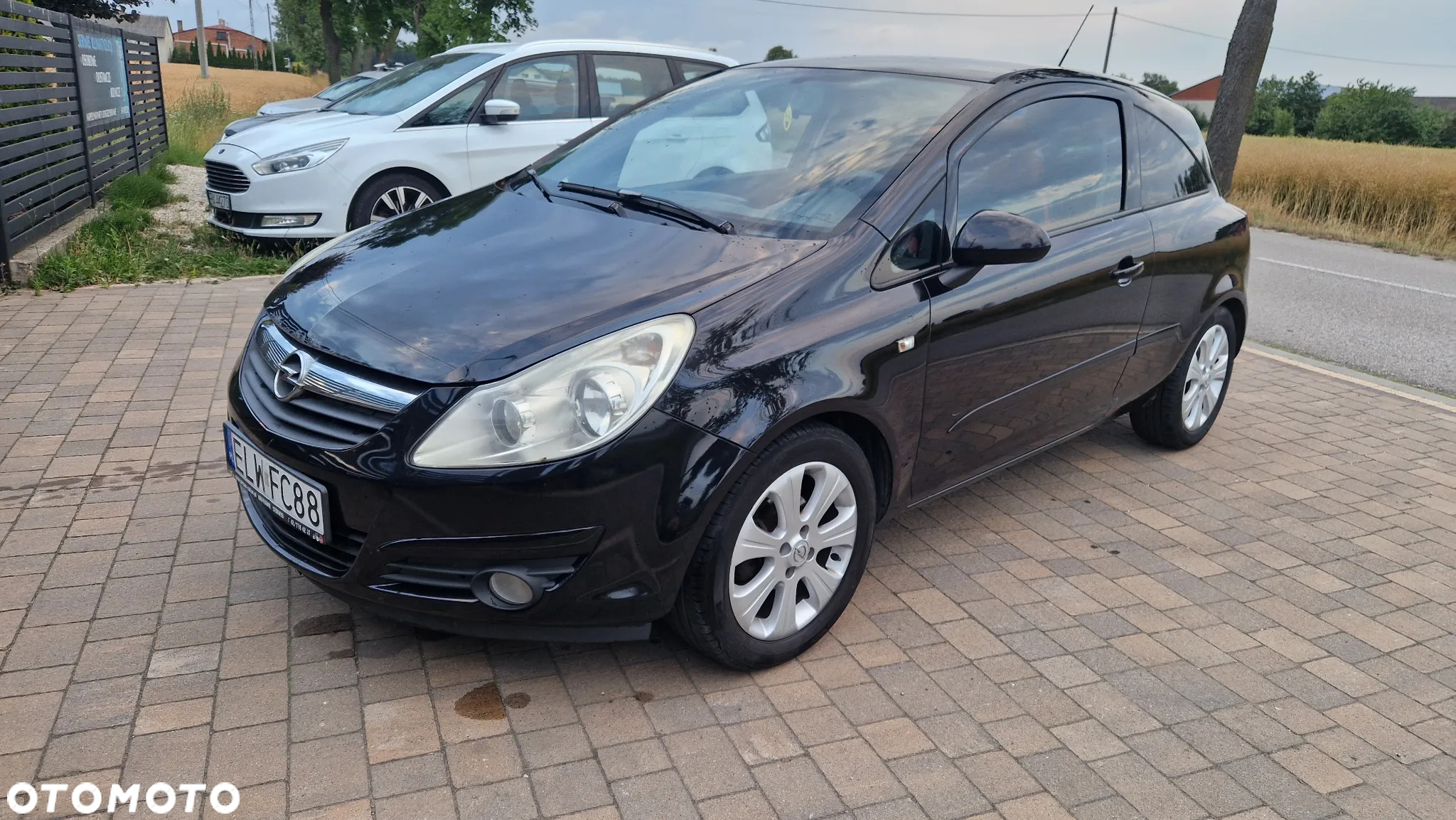 Opel Corsa 1.4 16V Enjoy - 12