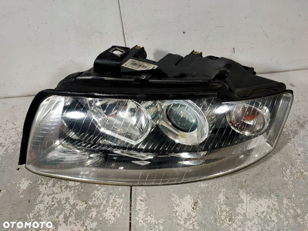 lampa lewa reflektor lewy audi a4 b6 8e0941029c
