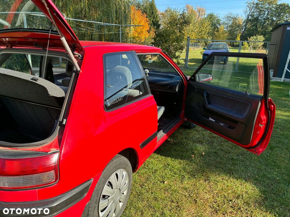 Mazda 323 - 12