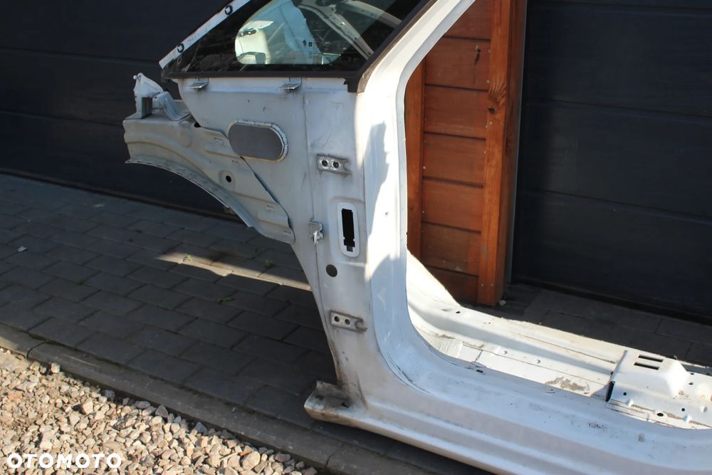 BŁOTNIK ĆWIARTKA LEWY BOK TYŁ LEWA TYLNA PRÓG OPEL ZAFIRA C 40R - 11