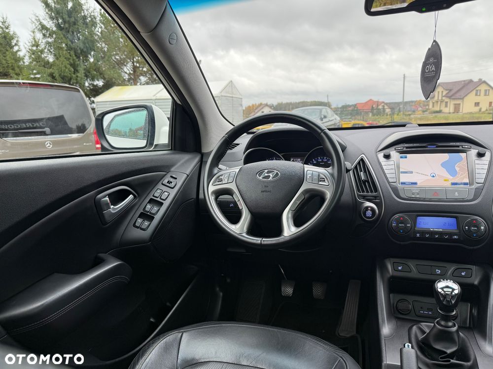 Hyundai ix35 blue 1.6 2WD Finale Gold - 14