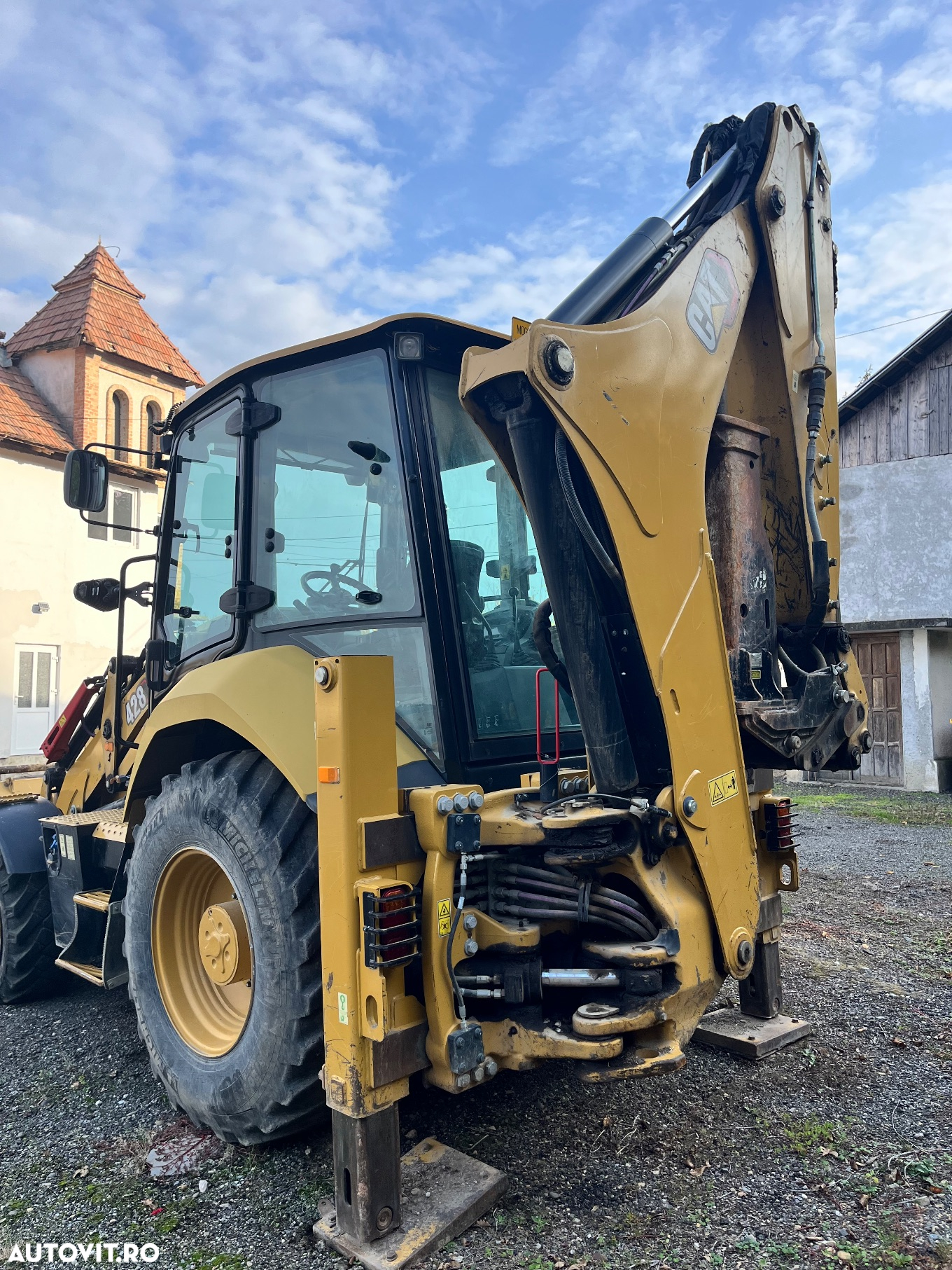 Caterpillar 428 - 6