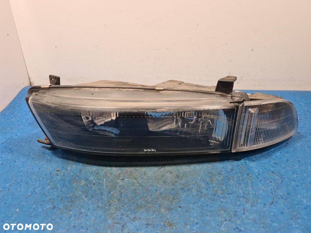 MITSUBISHI GALANT VIII LIFT REFLEKTOR LEWY - 1