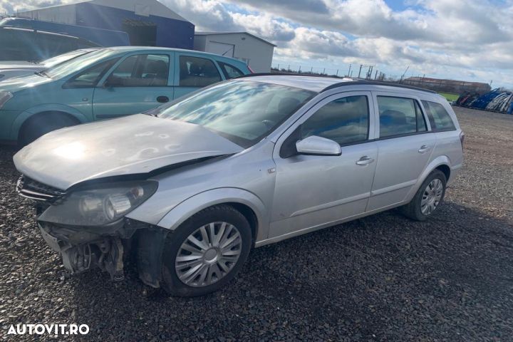 Turbosuflanta Opel Astra H  [din 2004 pana  2007] seria wagon 1.7 CDTI MT (80 hp) - 9