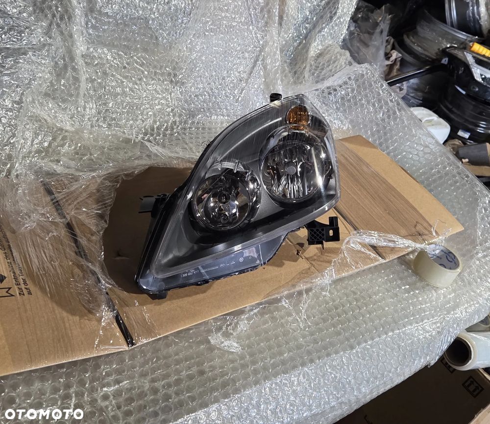 Lampa lewa przód przednia Opel Zafira B Lift 93190408 13252472 Reflektor lewy przód przedni Opel Zafira B Lift - 2