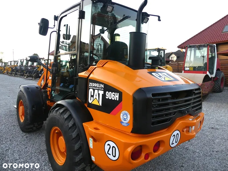 Caterpillar CAT 906H / Z Niemiec / 6424mtg / - 28