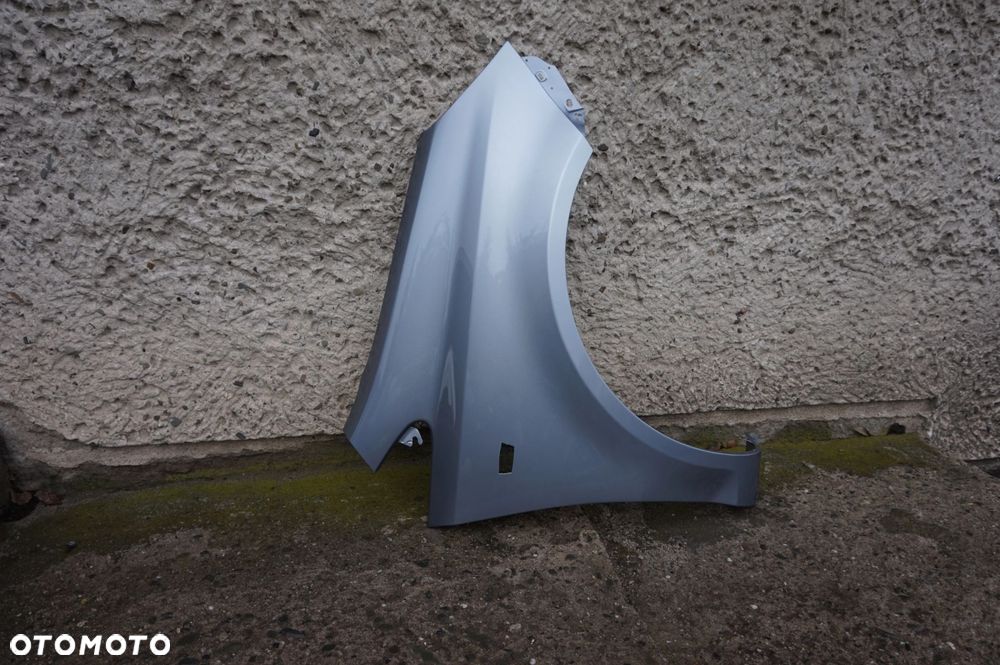 BŁOTNIK PRZEDNI PRAWY OPEL CORSA D Z163 - 2