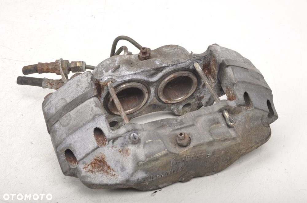 DEFENDER ZACISK HAMULCOWY PRZÓD 3247-684C