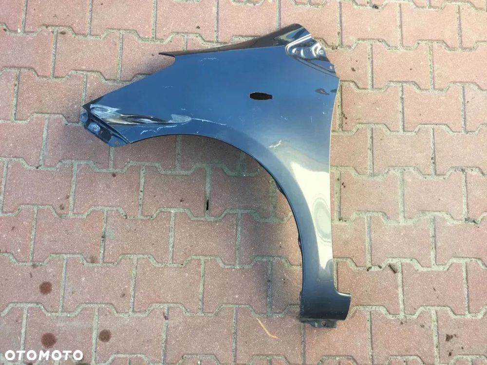 TOYOTA YARIS 2 II 2006-2011 BŁOTNIK LEWY PRZÓD PRZEDNI - 1