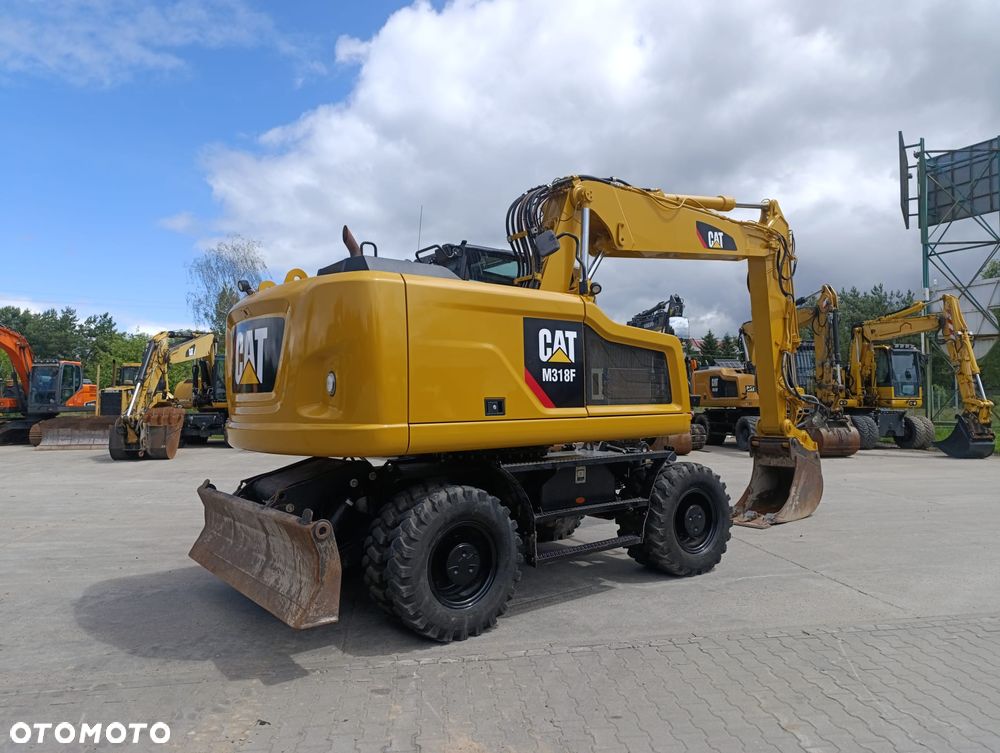 Caterpillar M318 - 1