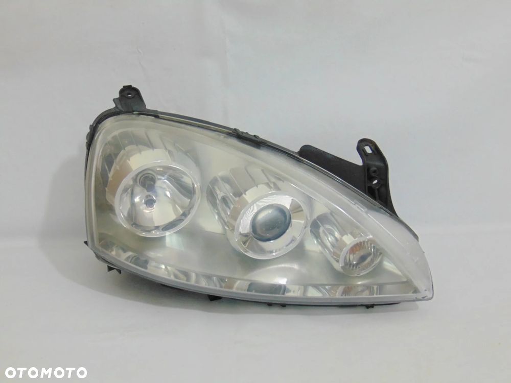 ORYGINAŁ lampa przednia przód lewa prawa Opel Corsa C FL lift 03-06r - 2