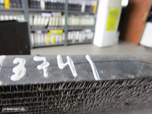 Radiador AC 710100200F06 RENAULT LAGUNA 2005 2.2DCI USADO - 1
