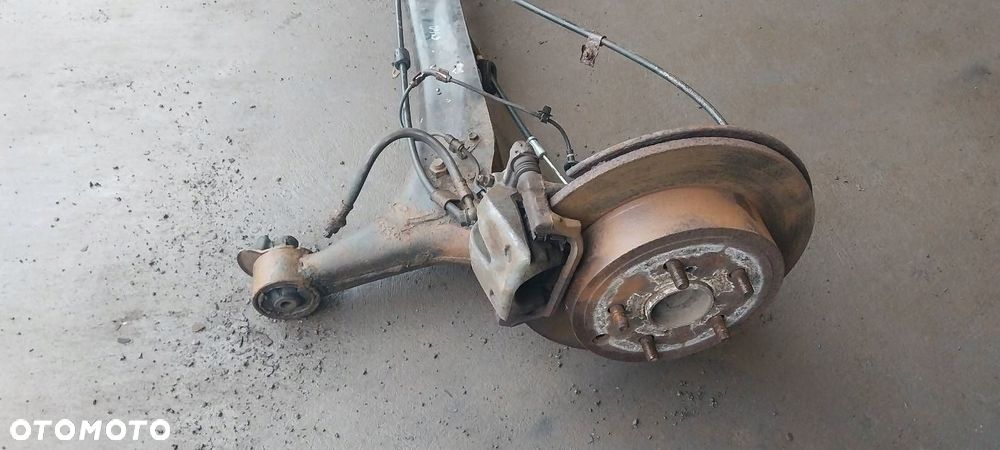 BELKA OŚ ZAWIESZENIA TYŁ TARCZE Z ABS TOYOTA COROLLA VERSO II - 4