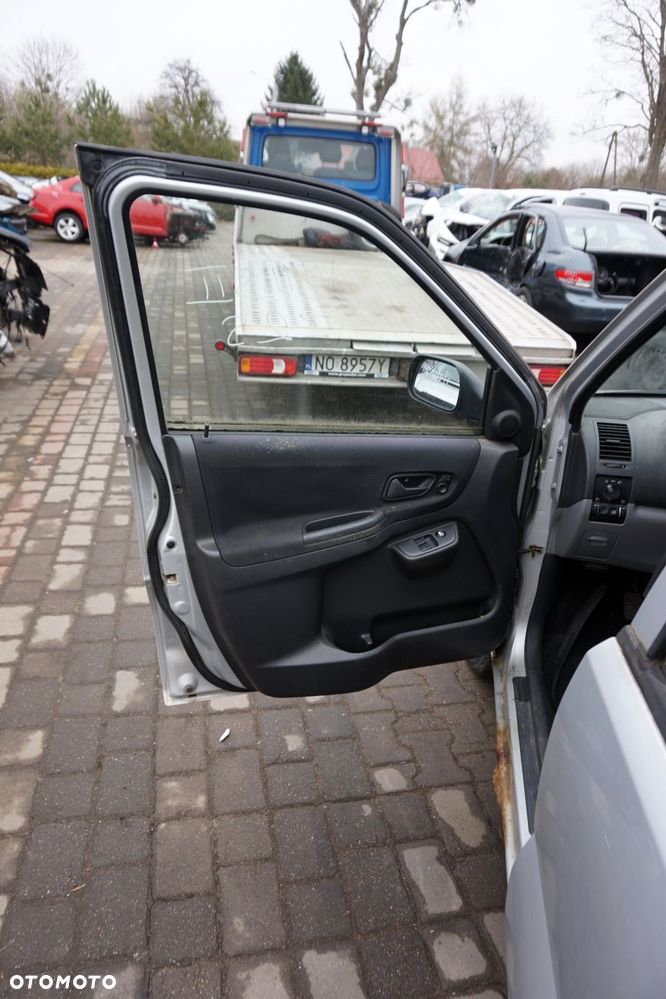 DRZWI PRZEDNIE LEWE IGNIS II Z2S  SREBRNY SUZUKI 2003-2011 - 8