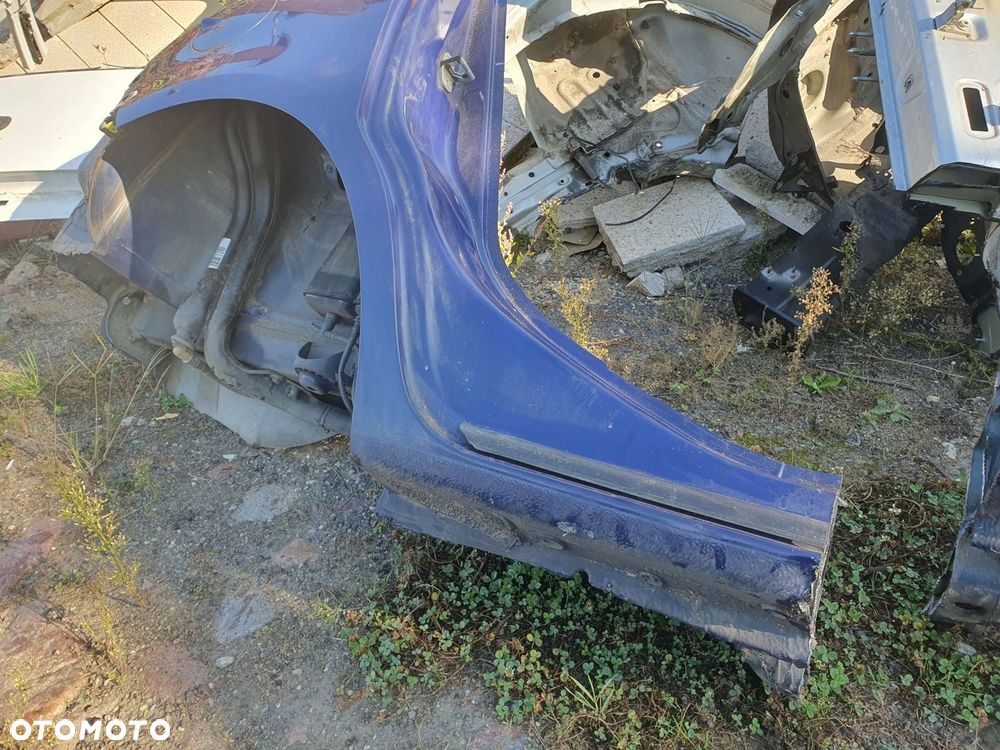 błotnik prawy tył Opel Corsa E - 3