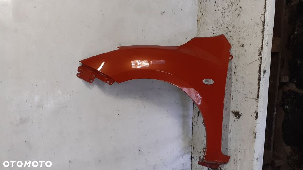 * BŁOTNIK LEWY PRZEDNI PRZÓD mazda 3 II 2008-2013r CZERWONY