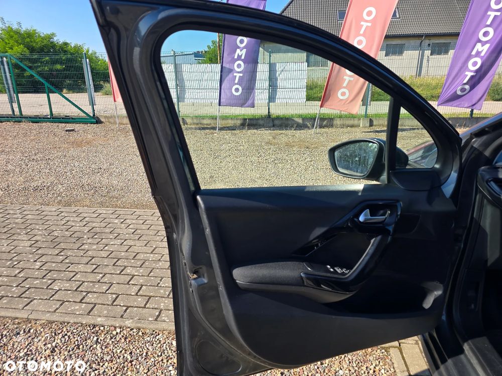 Peugeot 208 1.2 PureTech Style - 18