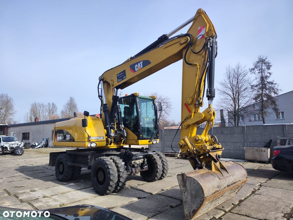 Caterpillar 318D - 12