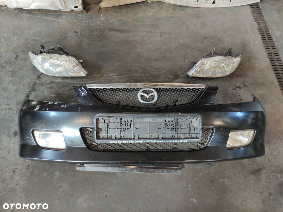 ZDERZAK + LAMPY MAZDA 323 BJ - 1