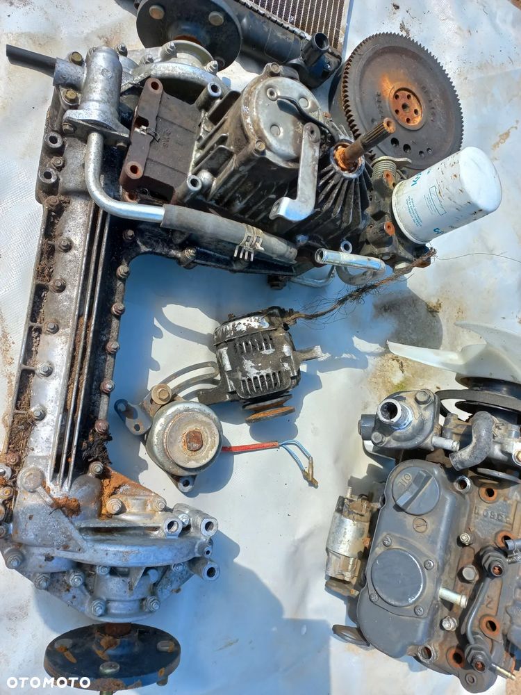 Części Kubota silnik Z602,chłodnica,koło zamachowe,wtrysk,napęd GR 2000,alternator,rozrusznik,piasta - 2