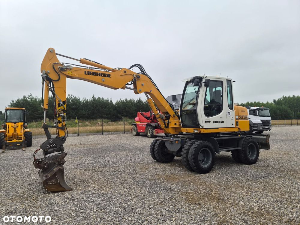 Liebherr A 309 Litronic - 8