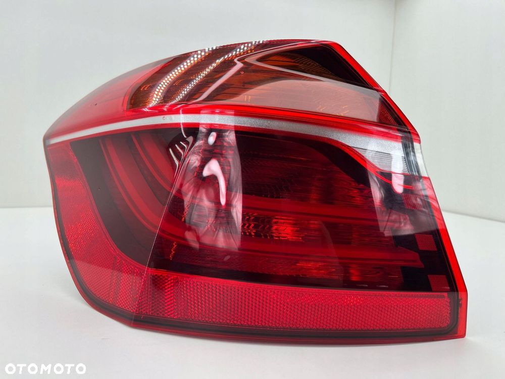 BMW 2 F45 LCI LAMPA LEWA W BŁOTNIK TYŁ 7491335 - 2