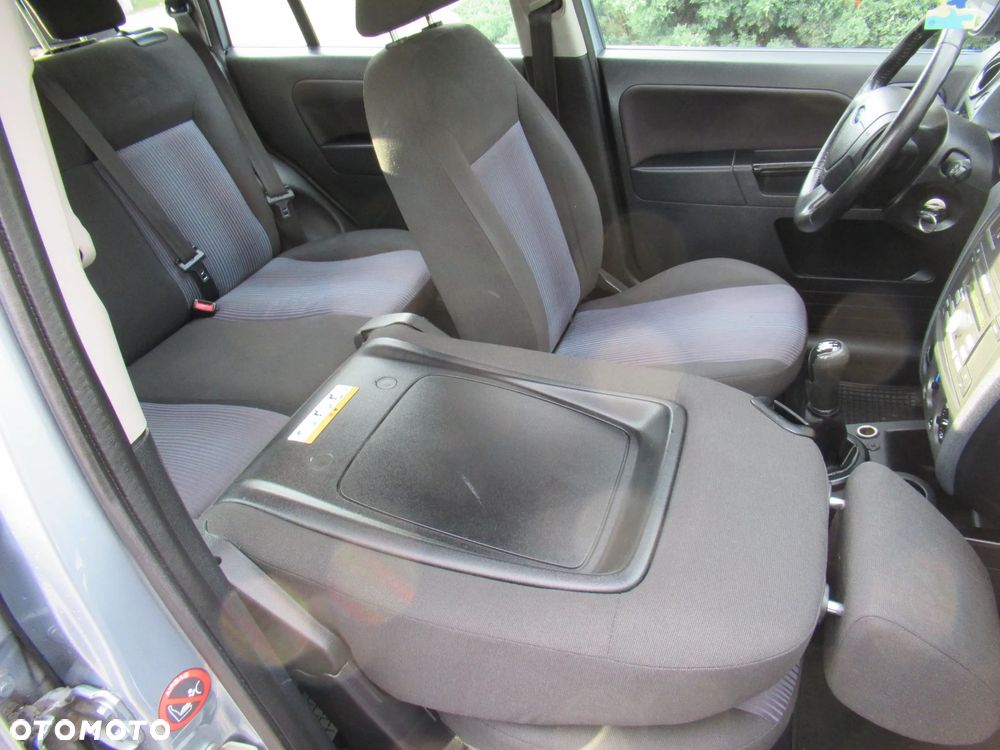 Ford Fusion 1.4 + - 31