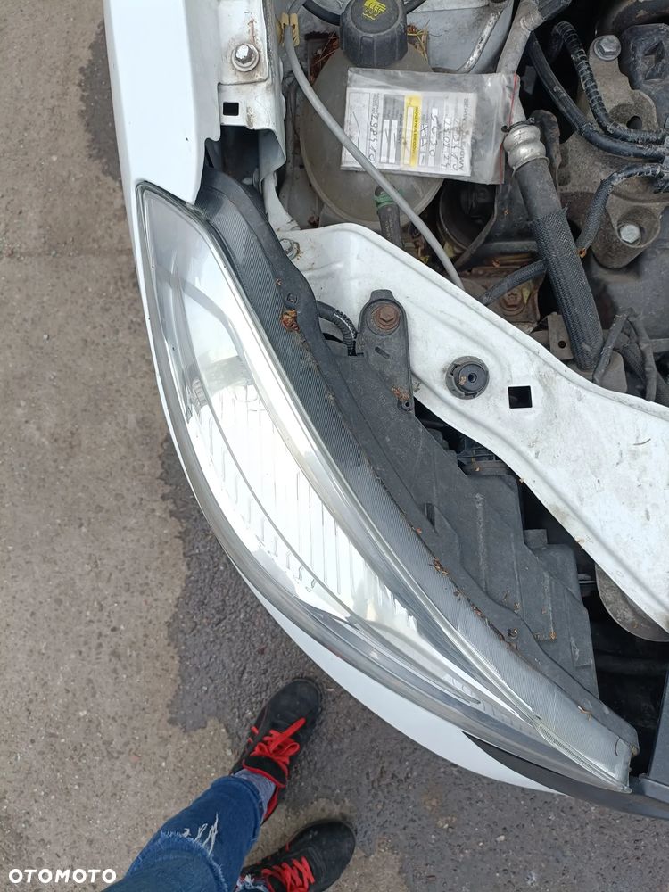 DACIA DOKKER 12-17 2013 r. lampa prawy przód prawa przednia PP EU * - 4