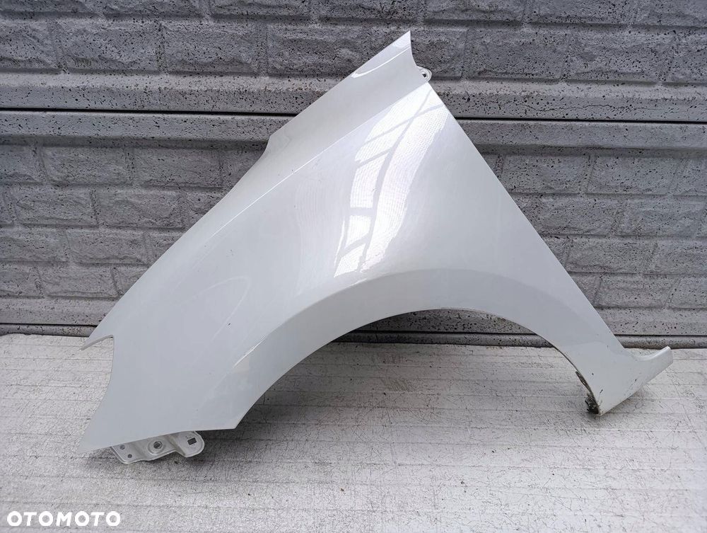 SUZUKI SWIFT MK8 17-23 BŁOTNIK PRZEDNI LEWY ORYGINAŁ - 1