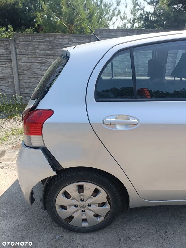 TOYOTA YARIS II 05-11 LIFT 2009 r. 1E7 5D HB błotnik ćwiartka prawy tył PT - 1