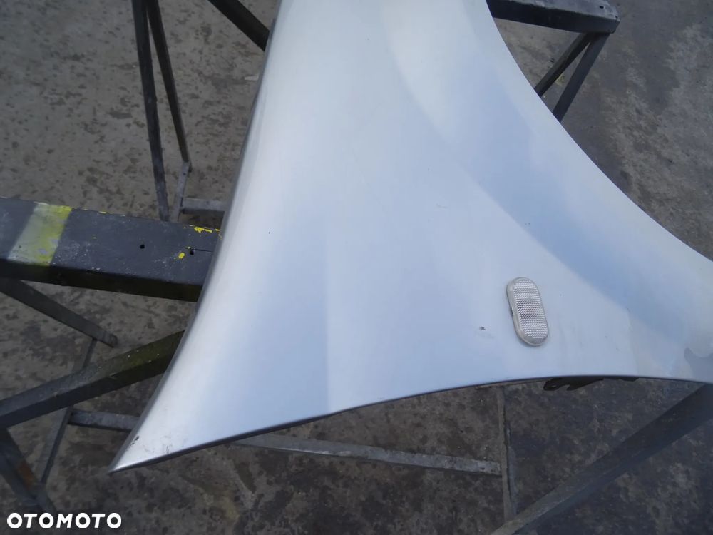 Błotnik Dacia Logan Prawy Przód - 6