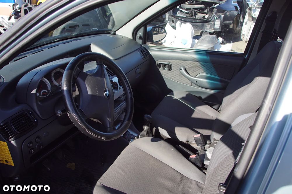 Auto na części - Tata Indica 1.4 MPI 85 KM 475 Si 26902610 TAT736 2009R Silnik Skrzynia Drzwi Błotnik Zderzak Maska Klapa Lampa Lusterko Deska Kokpit Sterownik Moduł Czujnik Licznik Kierownica - 10