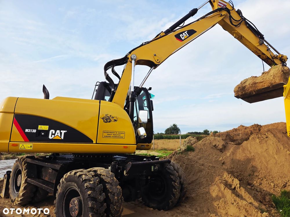 Caterpillar M313 D - 19