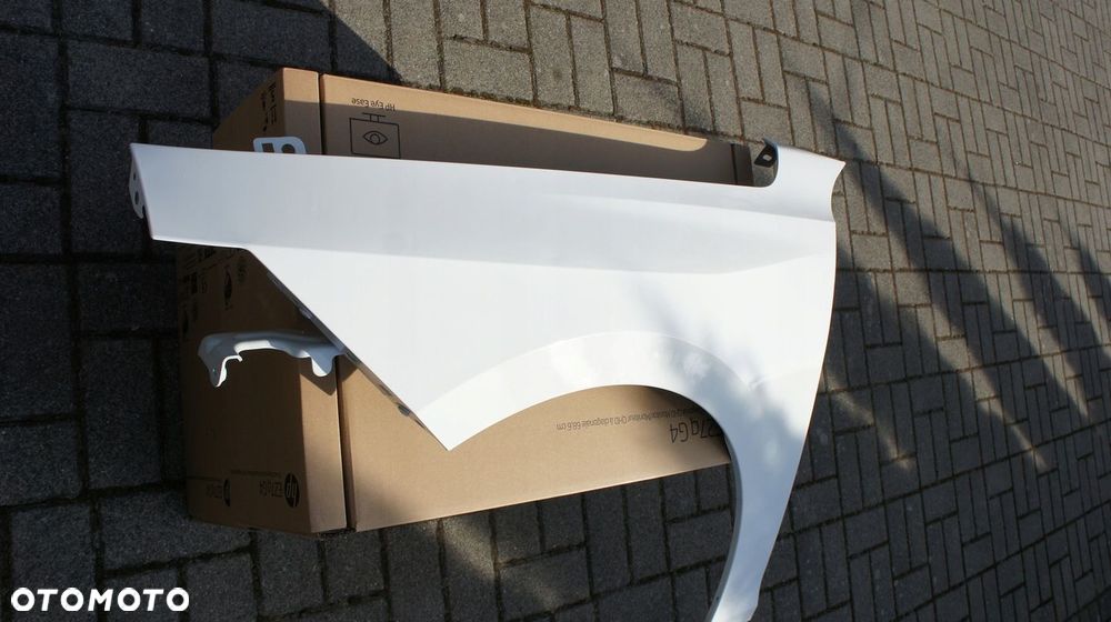 PRZEDNI LEWY BŁOTNIK OPEL ASTRA L VI - 2
