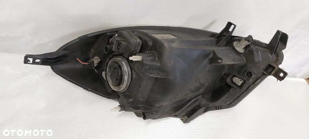 .  LAMPA PRZOD LEWA NISSAN NOTE E11 - 2