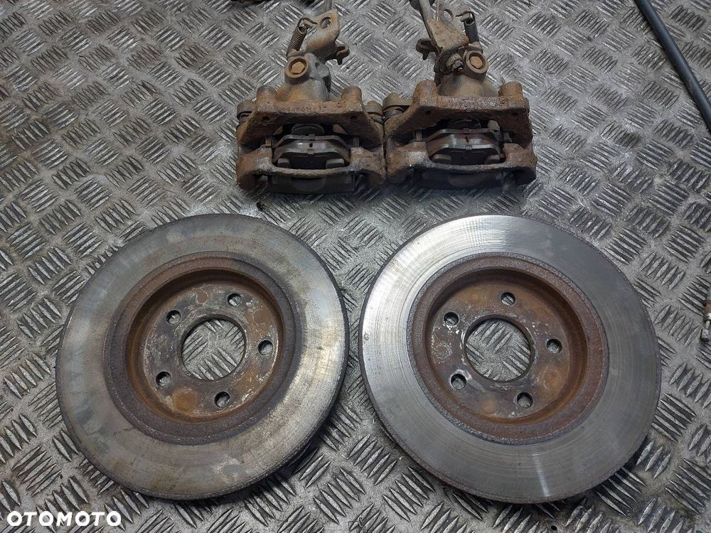 TARCZE HAMULCOWE TYŁ + KLOCKI + ZACISKI FORD MONDEO MK3 HB 5D - 3