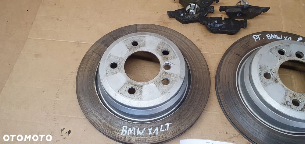 Tarcze hamulcowe tył tylne klocki BMW X1 E84 2.0D - 2