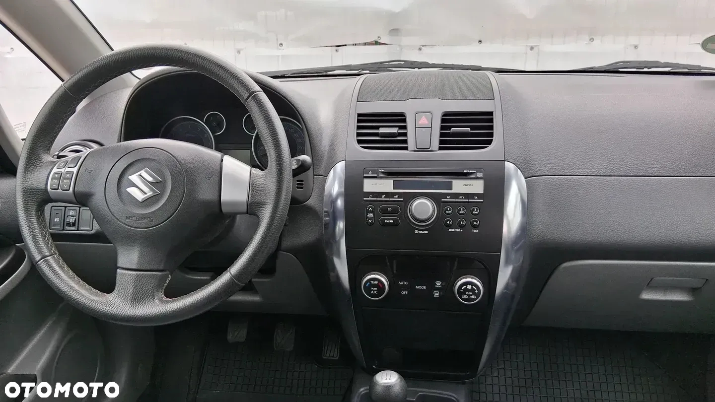 Suzuki SX4 1.6 Comfort Plus - 14