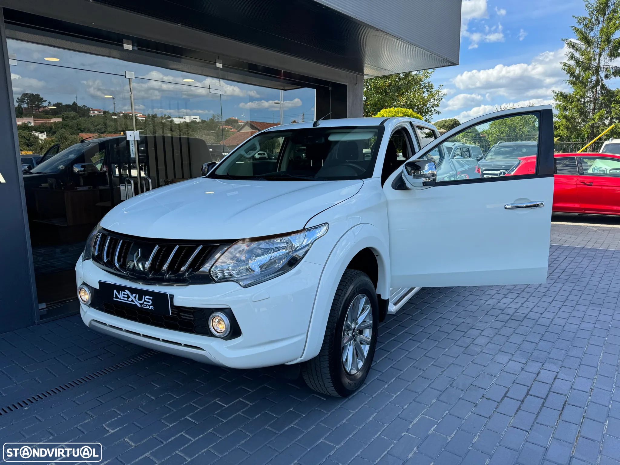 Mitsubishi L200 2.4 DI-D CD Instyle Strakar AT 4WD - 4