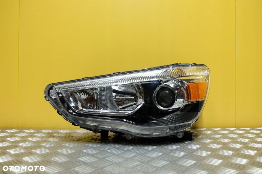 MITSUBISHI ASX RVR 10- REFLEKTOR LAMPA ZWYKŁA LEWA USA - 1