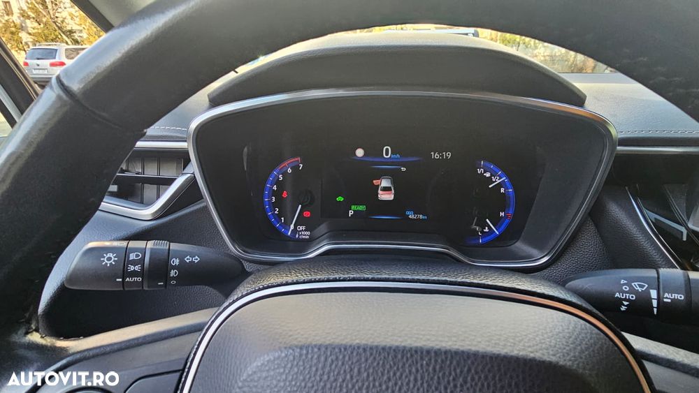 Toyota Corolla 1.8 HSD Exclusive - 10